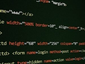 A digital book showing code and marketing icons representing educational excellence and tech mastery